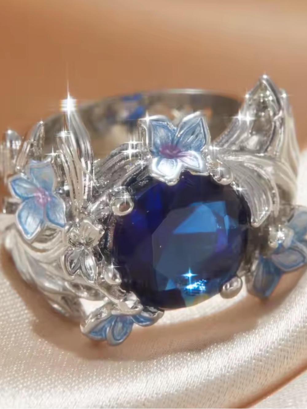 Silver Ring with Deep Blue Center and Blue Floral Accents - Picture 3 of 4